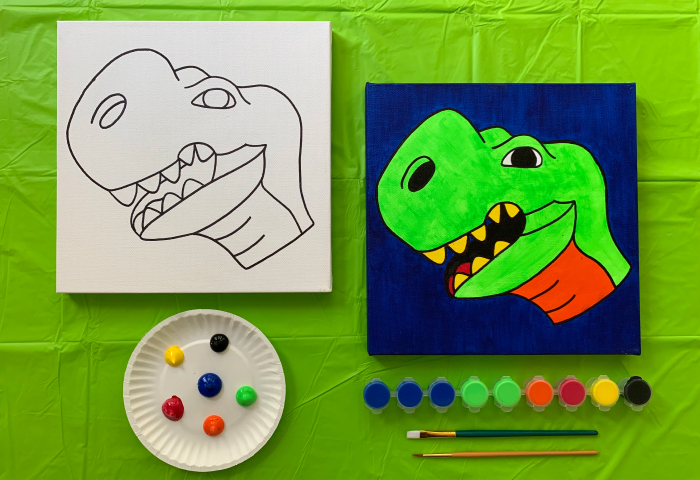 Dinosaur canvas sketch next to finished painting with paint supplies